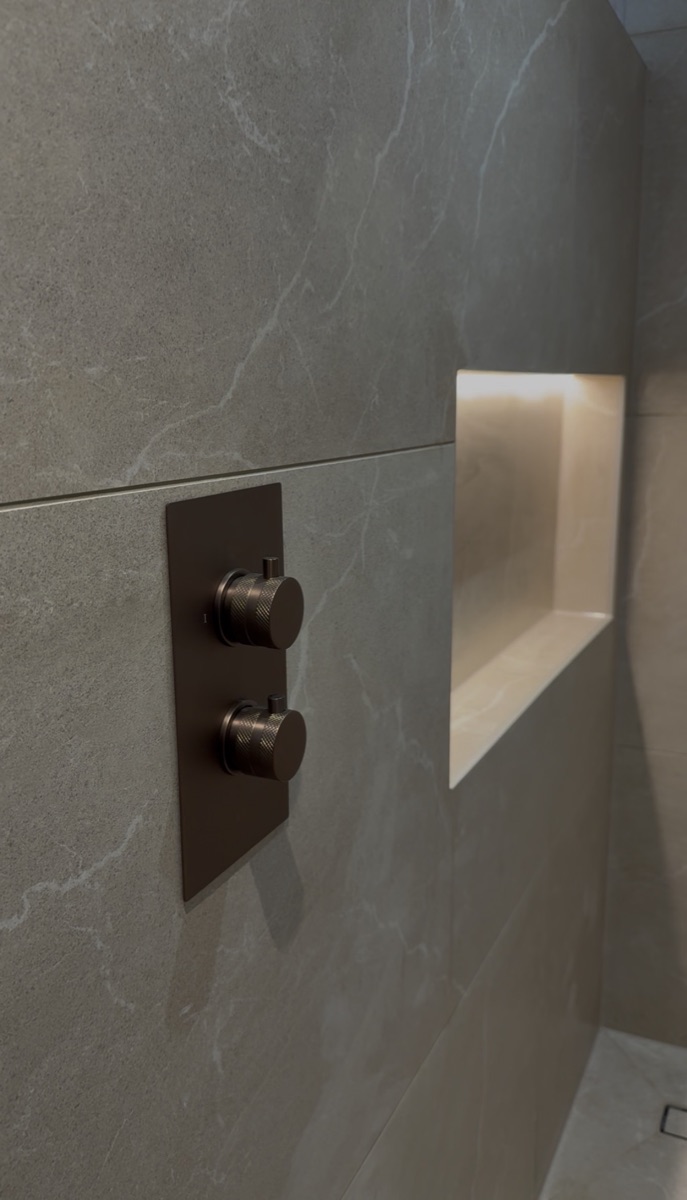 Shower niche and brassware detail