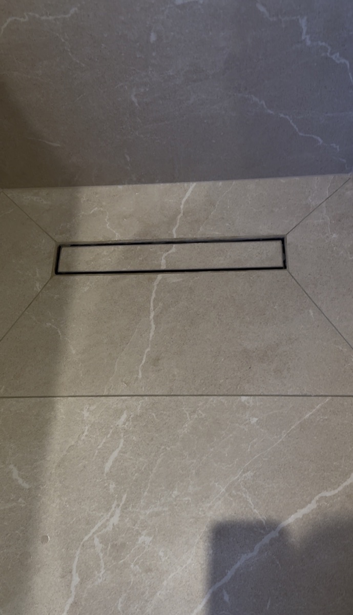 Tiling and shower drain finish detail