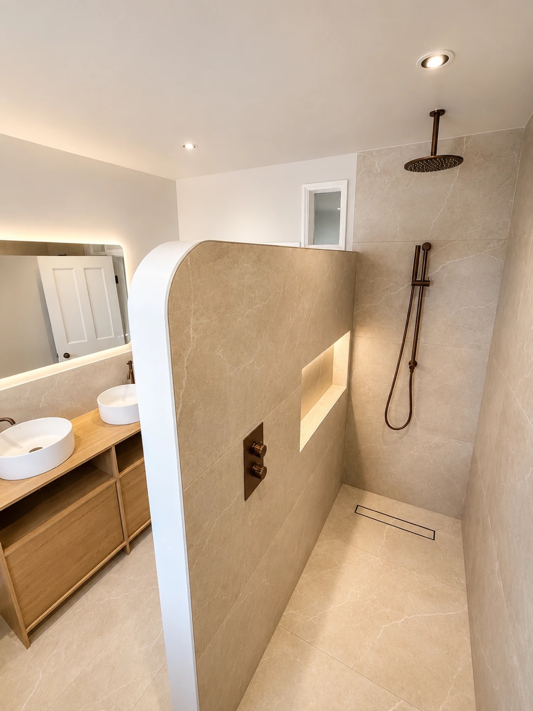 Precision walk-in shower with glass screen and brushed fittings