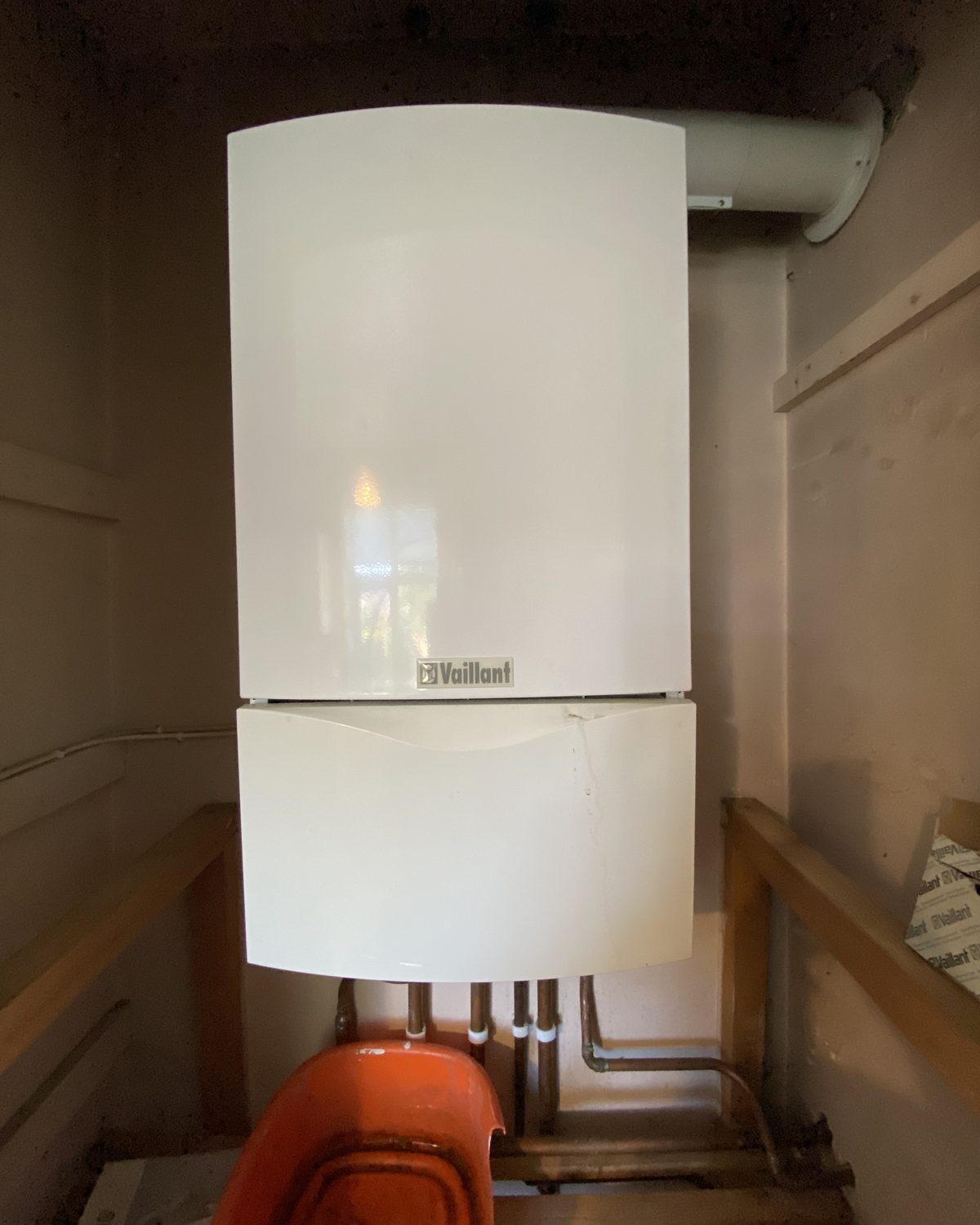 Old Vaillant boiler in a cupboard before replacement